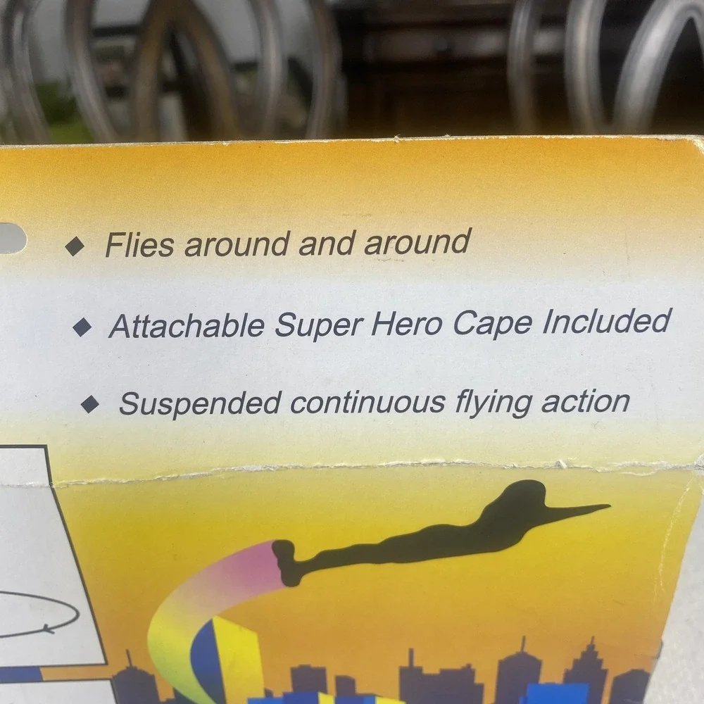 Flying Super Hero Action Figure Toy Battery Operated Cape Included Spins In Air